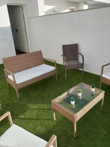 Posedenie v ubytovaní Tríplex Cruz del Mar Beach, Apartamentos Living Sur
