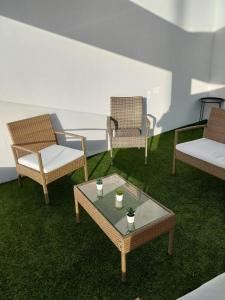 Posedenie v ubytovaní Tríplex Cruz del Mar Beach, Apartamentos Living Sur