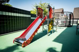 a playground with a slide at Heaven House Penthousewohnung Siebter Himmel in Timmendorfer Strand