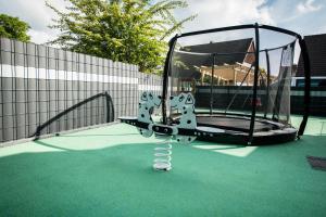 an empty trampoline on a tennis court at Heaven House Penthousewohnung Siebter Himmel in Timmendorfer Strand