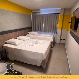 Postel nebo postele na pokoji v ubytování Hotel Coroados Foz Express
