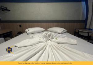 Postel nebo postele na pokoji v ubytování Hotel Coroados Foz Express