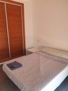 Cama o camas de una habitación en FORTUNATO ARIAS 17