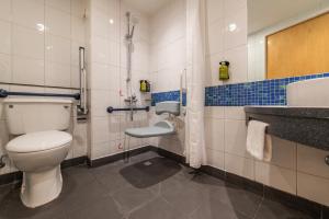 a bathroom with a toilet and a sink at Holiday Inn Express Ramsgate – Minster by IHG in Minster