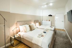 Cama o camas de una habitación en Superb Flat in South Kensington