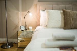 Cama o camas de una habitación en Superb Flat in South Kensington
