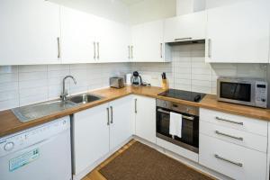 Una cocina o zona de cocina en Superb Flat in South Kensington