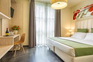 Postel nebo postele na pokoji v ubytování Hotel San Marco + 37 fotografií