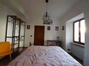 Posteľ alebo postele v izbe v ubytovaní La Casa dei Bersaglieri