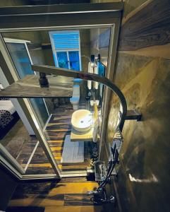 an overhead view of a bathroom in a house at 8 Plus Motels in Negombo