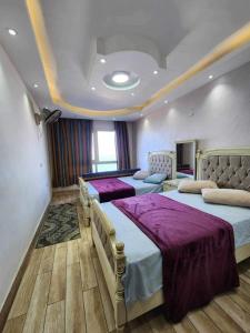 A bed or beds in a room at Amazing Sea View 2 bedroom apartment