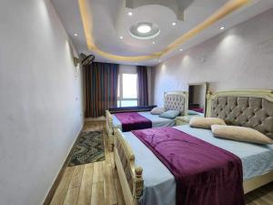 A bed or beds in a room at Amazing Sea View 2 bedroom apartment