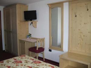 Postel nebo postele na pokoji v ubytování Hotel Negritella