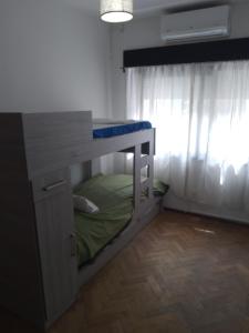 Una cama o camas cuchetas en una habitación  de El gallego
