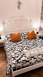 A bed or beds in a room at Il Salernitano Bed and Breakfast