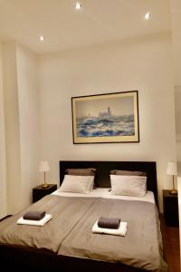 Posteľ alebo postele v izbe v ubytovaní Broadway Downtown Deluxe Budapest