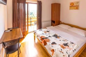 Postel nebo postele na pokoji v ubytování Guesthouse Pavlin