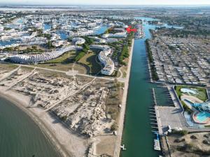 an aerial view of a harbor with a marina at Studio 237 Port Camargue, Piscine, Climatisation, 2 personnes in Le Grau-du-Roi