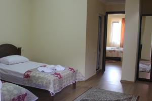 Кровать или кровати в номере Marani Hotel