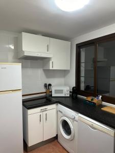 Kuchyň nebo kuchyňský kout v ubytování Apartamento Los Lances + 6 fotografií