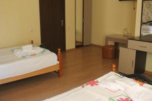 Кровать или кровати в номере Marani Hotel