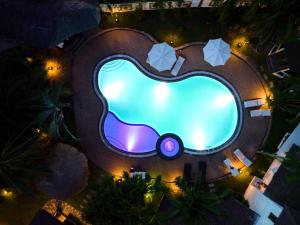 an overhead view of a swimming pool at night at Jaguar House Resort Muine in Mui Ne
