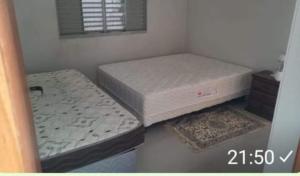 a room with two mattresses sitting on the floor at RANCHO PARAISO Do ZIRINHO in Guapé