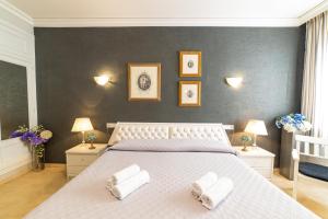Postel nebo postele na pokoji v ubytování Hostal Ya