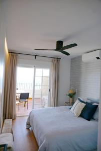 En eller flere senge i et værelse på Marina Azul