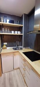 A kitchen or kitchenette at Apartamento El sarrio