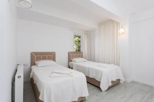 Ένα ή περισσότερα κρεβάτια σε δωμάτιο στο Villa Crystal +44 φωτογραφίες