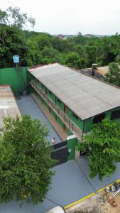 an overhead view of a building with a roof at Apartamentos IVAGO in Encarnación