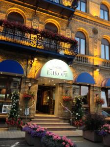 a building with a sign on the front of it at Hôtel EUROPE in Saverne