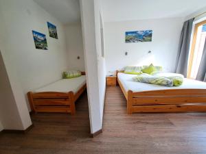 Ένα ή περισσότερα κρεβάτια σε δωμάτιο στο Apart Dahuam