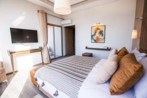 Postel nebo postele na pokoji v ubytování Villa ARGANINA piscine chauffée
