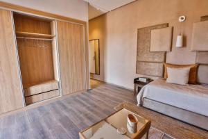 Postel nebo postele na pokoji v ubytování Villa ARGANINA piscine chauffée
