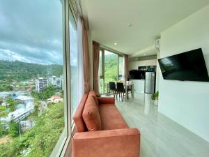 TV o dispositivi per l'intrattenimento presso Oceana Sea View - Kamala Beach