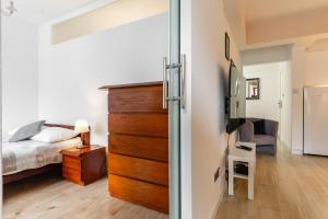 Posteľ alebo postele v izbe v ubytovaní Apartamenty Orkana Centrum Zakopane