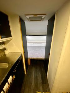 Postel nebo postele na pokoji v ubytování Garden Caravan