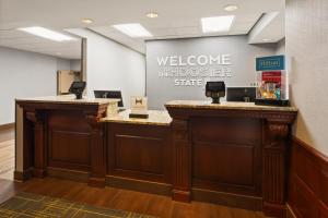 a welcome desk in a hospital lobby at Hampton Inn & Suites Scottsburg in Scottsburg