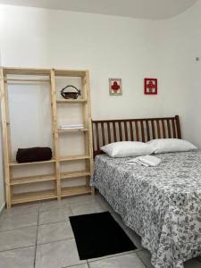 Llit o llits en una habitació de Apartamento a beira-mar Natal