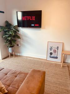 A television and/or entertainment centre at The Maiden Studio. Derry city. Studio Apartment.