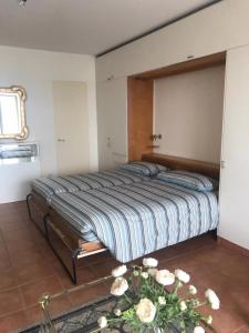 Ένα ή περισσότερα κρεβάτια σε δωμάτιο στο Bellevue- Bellavista