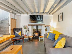 a living room with a couch and a fireplace at 2 bed in Brixham BX020 in Brixham