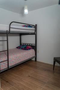 Dviaukštė lova arba lovos apgyvendinimo įstaigoje Casita en Arandas