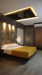 Voodi või voodid majutusasutuse Hotel Myst. toas