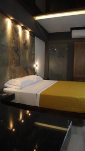 Voodi või voodid majutusasutuse Hotel Myst. toas