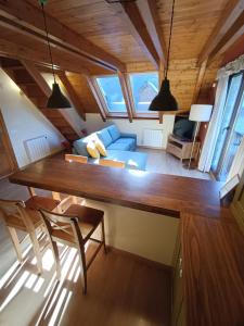 Posezení v ubytování Arties Centro 3 habitaciones, exclusivo familias + 32 fotografií