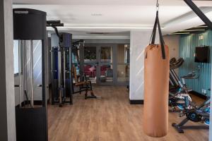 a gym with a large orange paddle in a room at Blue Liberdade in São Paulo
