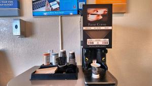 a coffee maker on a counter in a room at Motel 6-Webster, TX - Houston - Nasa Lake in Webster